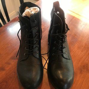 Black lace-up boots with zipper for easy on/off. 

Faux / Synthetic Leather